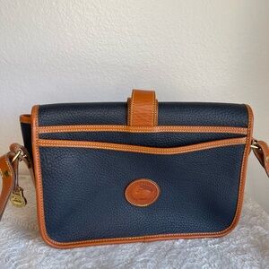 Vintage Dooney & Bourke Navy Pebbled Leather Bag with Saddle Brown Logo Patch